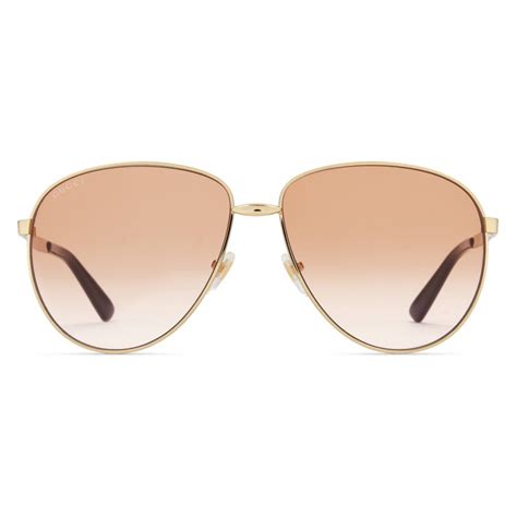 occhiali gucci aviator metallo donna|Occhiali da sole aviator in oro .